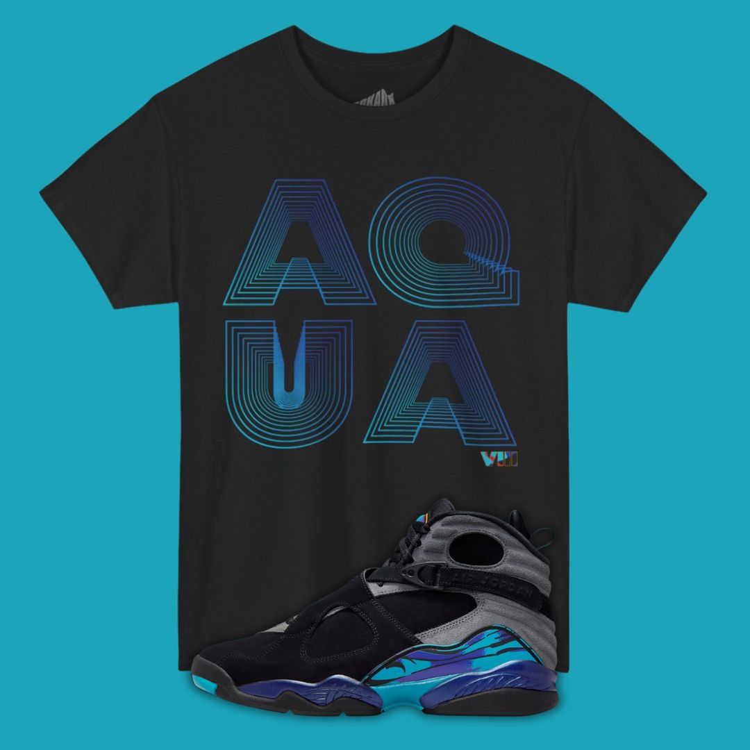 Black t-shirt with 'AQUA' design and matching sneakers on a blue background