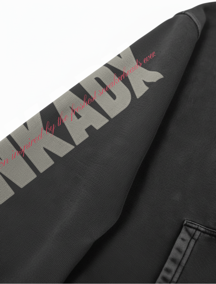 Black hoodie with 'SNKADX' branding on a white background