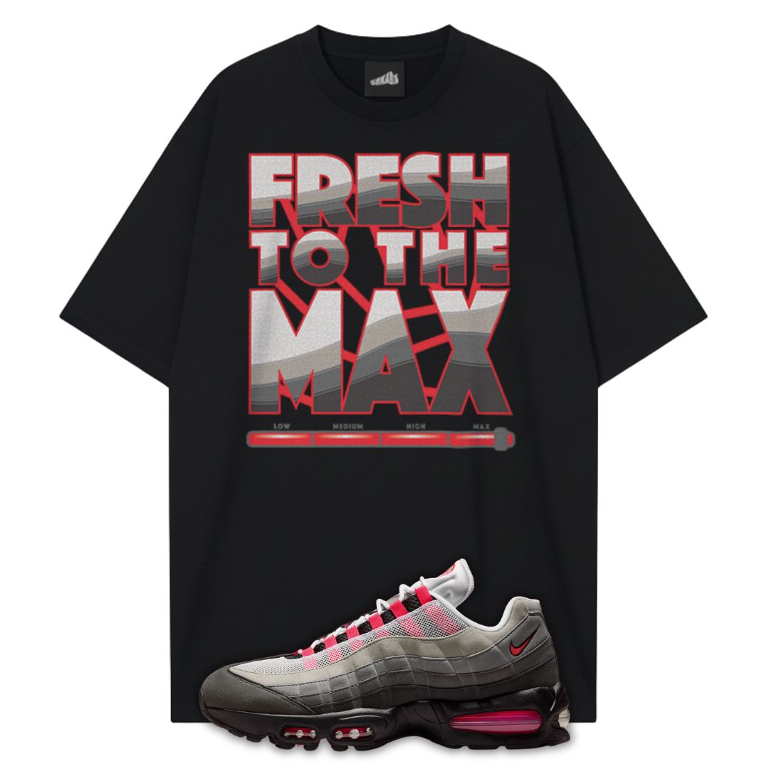 Black t-shirt with 'Fresh to the Max' graphic and a Air Max 95 Solar Red sneaker with red accents on a white background