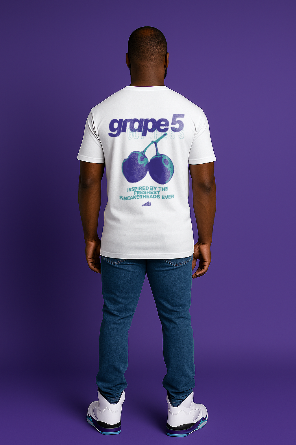 Man wearing Grape 5's Typography white T-Shirt Matching Jordan 5 Grape 2025 back view of shirt
