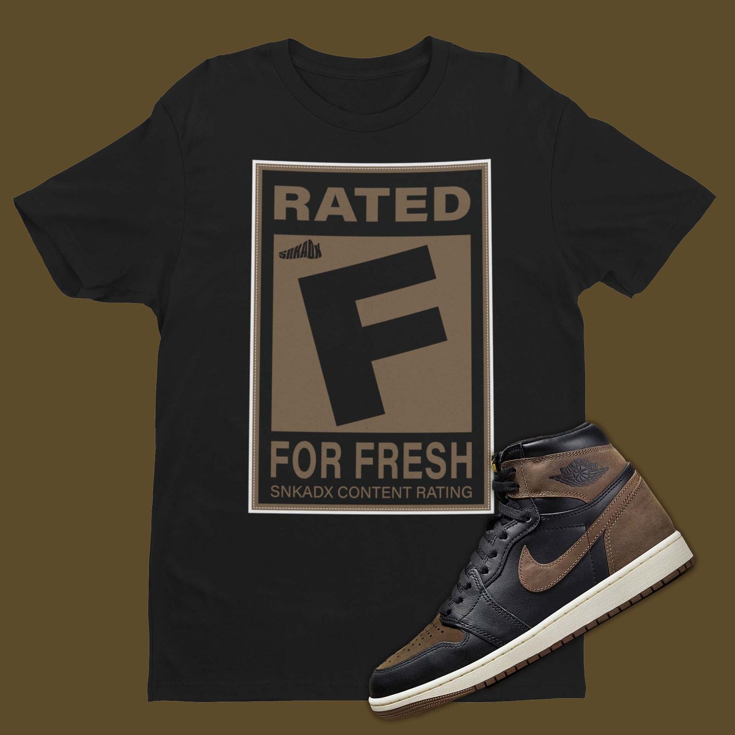 Rated F For Fresh Air Jordan 1 Palomino Matching T-Shirt with video game rating graphic on the front from SNKADX