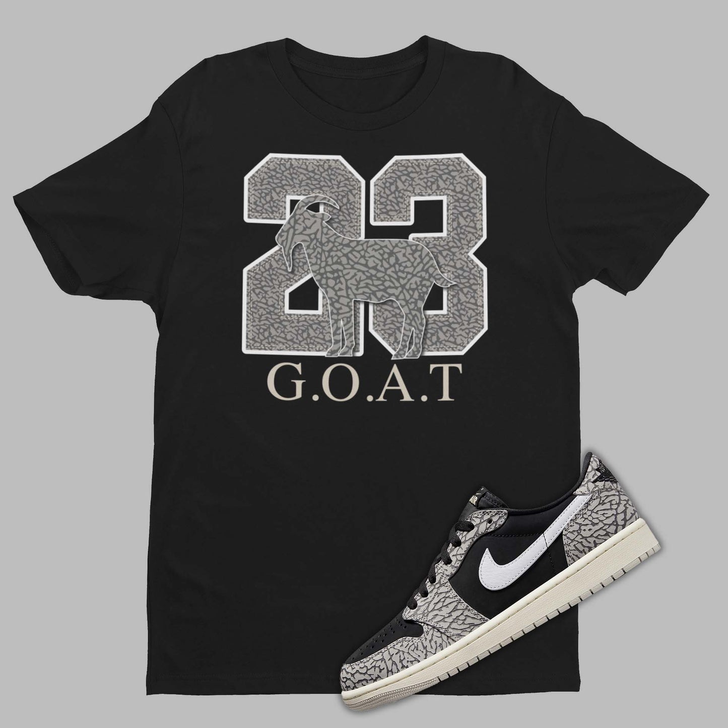 Black Cement 1's matching t-shirt in black with 23 and goat emoji on the front.