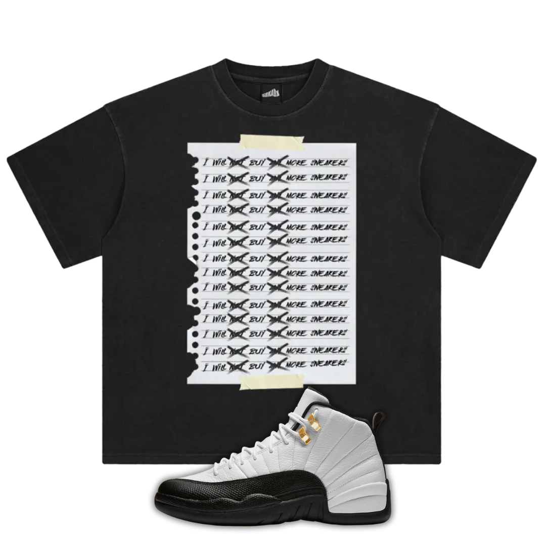 Black t-shirt with white graphic design and a Air Jordan 12 Taxi sneaker on a white background