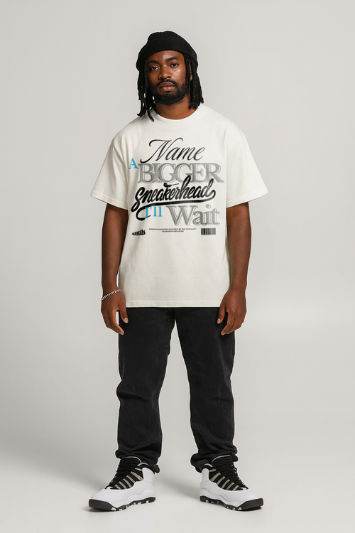 Person wearing a white t-shirt to match Air Jordan 10 Steel with text and black pants on a plain background