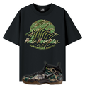 Back tee with image of mountains in a camouflage print and a Nike Air Foamposite Pro Camo sneakers in the front