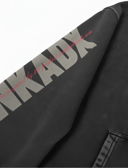 Black hoodie with 'SNKADX' branding on a white background