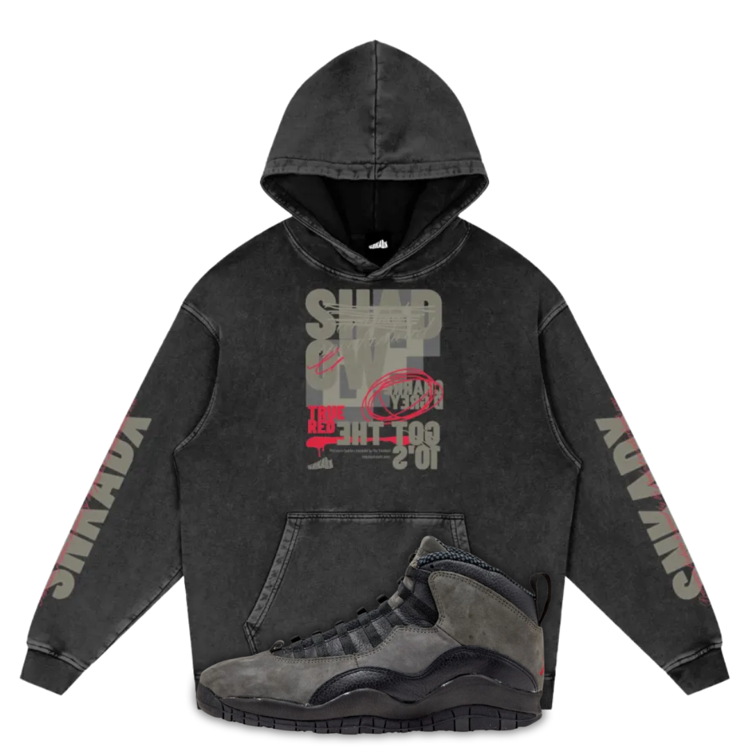 Black hoodie with graphic design and Air Jordan 10 Shadow on a white background