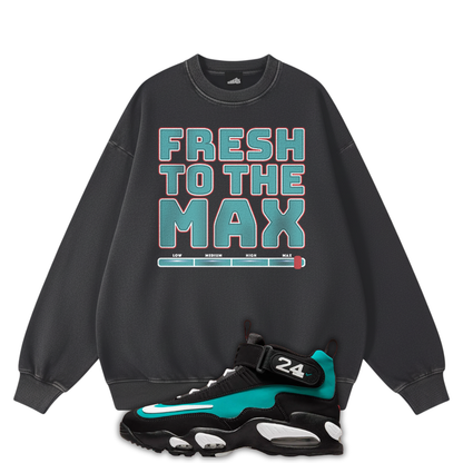 Black sweatshirt with 'Fresh to the Max' text and a black Air Max Griffey 1 Freshwater with teal accents on a white background