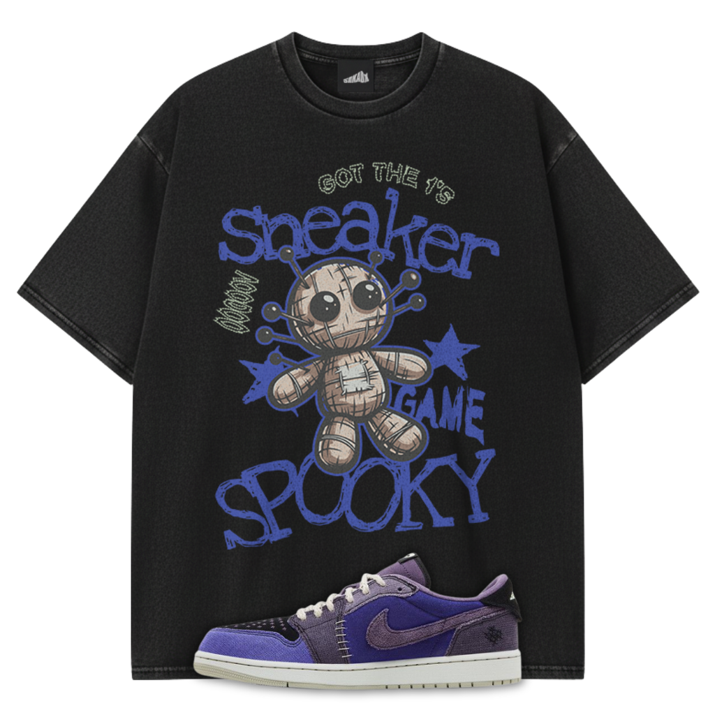 Black t-shirt from SNKADX with graphic design and Zion Williamson x Air Jordan 1 Voodoo Alternate sneakers on a white background.