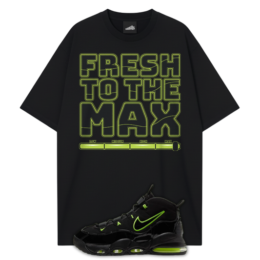 Black t-shirt with 'Fresh to the Max' Black Volt Uptempo 95 text and black sneaker with green accents on a bright green background