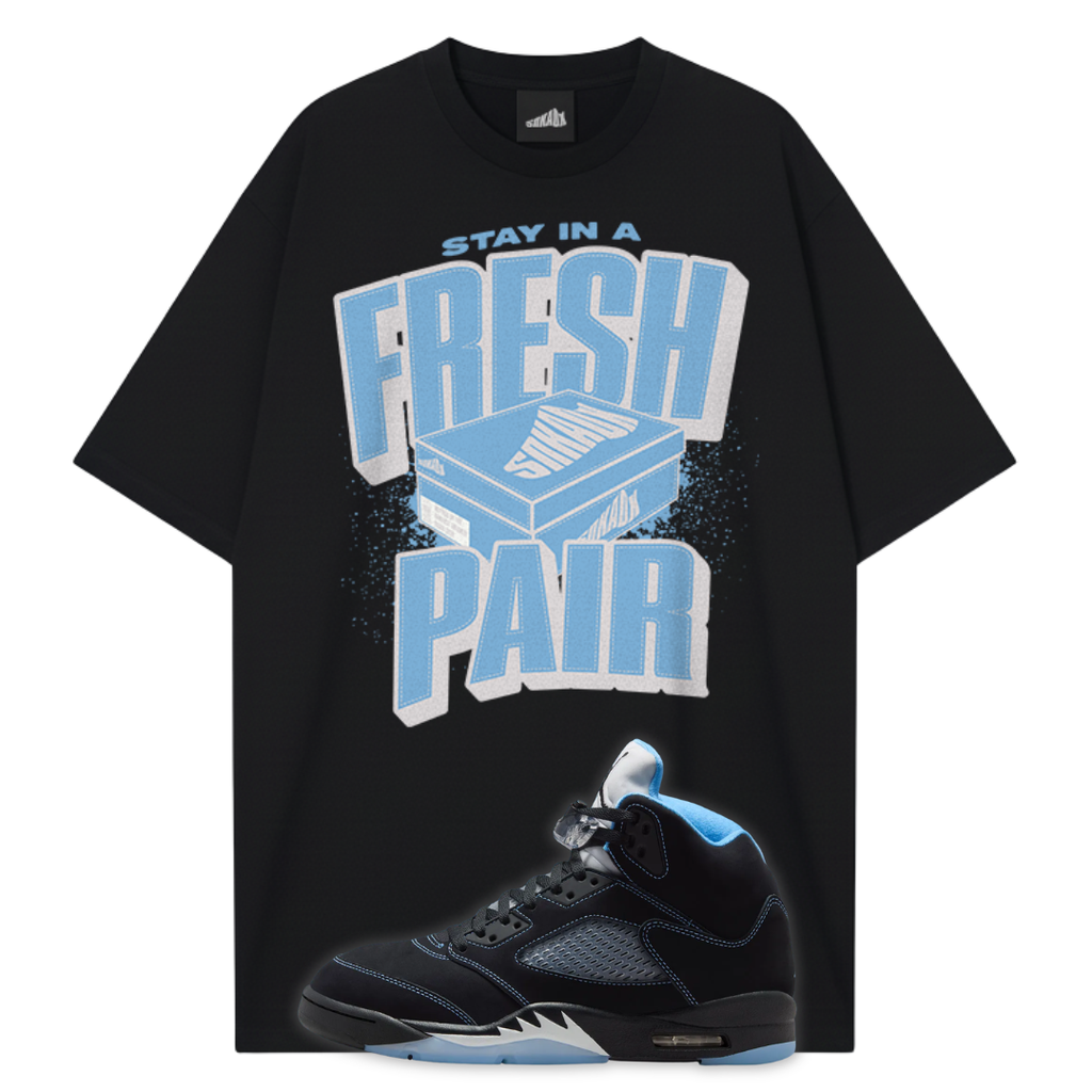Black t-shirt with 'Stay in a Fresh Pair' graphic and a Air Jordan 5 Black Carolina with blue accents.