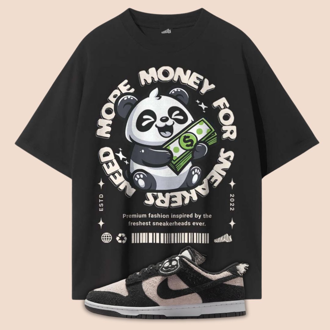 Black t-shirt with a panda graphic and text on a beige background matches nike dunk low panda white black