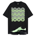 Black t-shirt with green and gray graphic design and a matching New Balance 1000 Black Neon Green sneakers on a white background