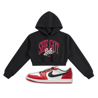 Black hoodie with red She Got Sole text and a Jordan 1 Chicago sneaker on a white background