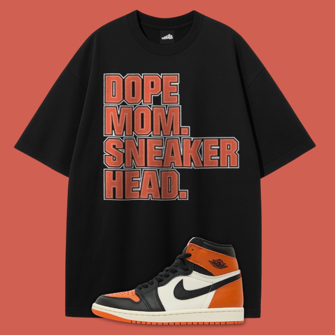 Black t-shirt with 'DOPE MOM SNEAKER HEAD' text and an Air Jordan 1 Shattered Backboard on a red background