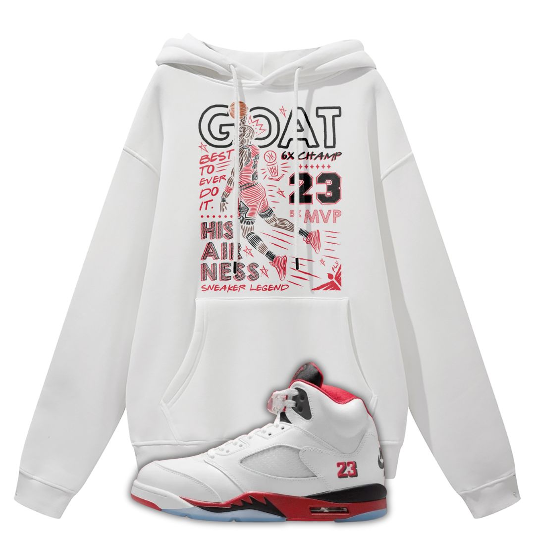 White hoodie with Michael Jordan dunking a basketball design and a white sneaker with red and black accents on a white background