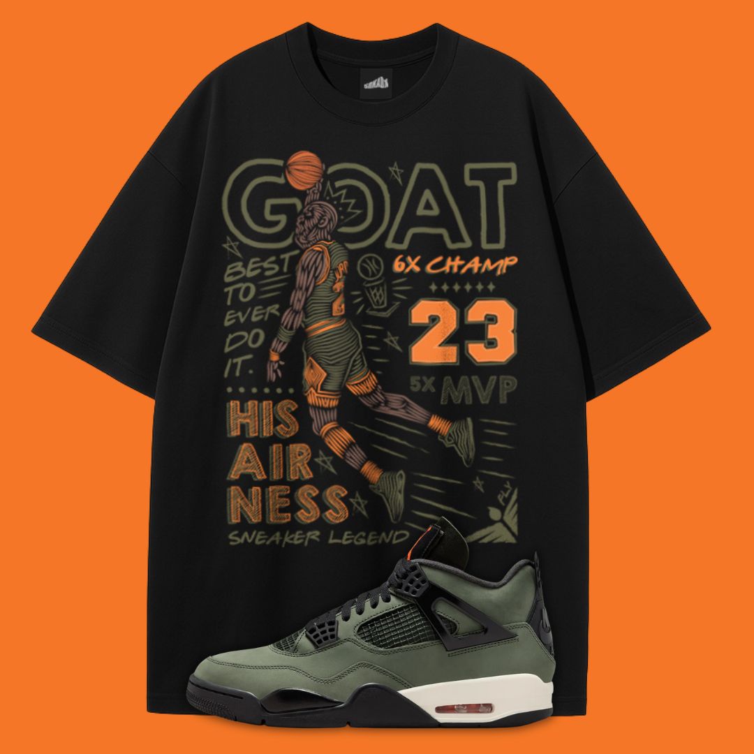 Black t-shirt with sports-themed graphics and a Air Jordan 4 Undefeated sneaker on an orange background