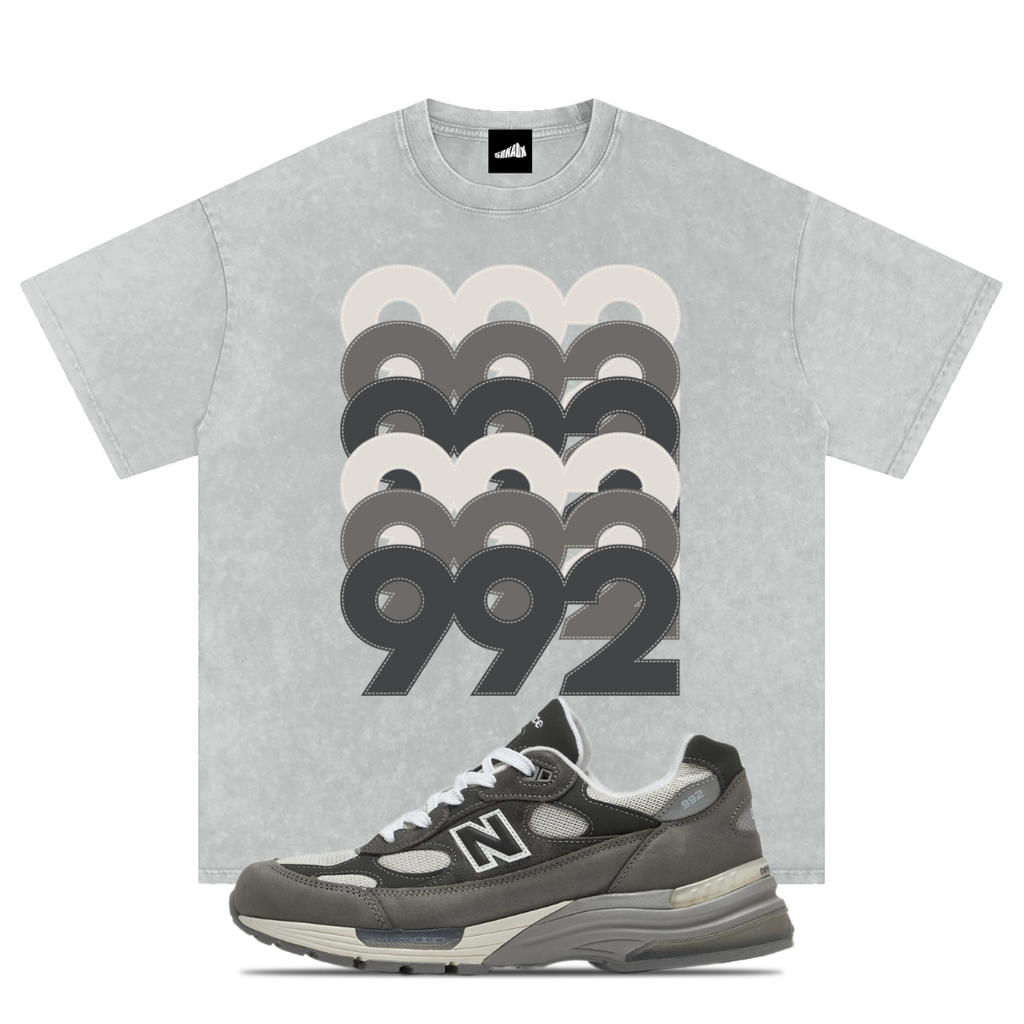 Gray t-shirt with '992' design and matching New Balance 992 Shadow Grey sneaker on a white background