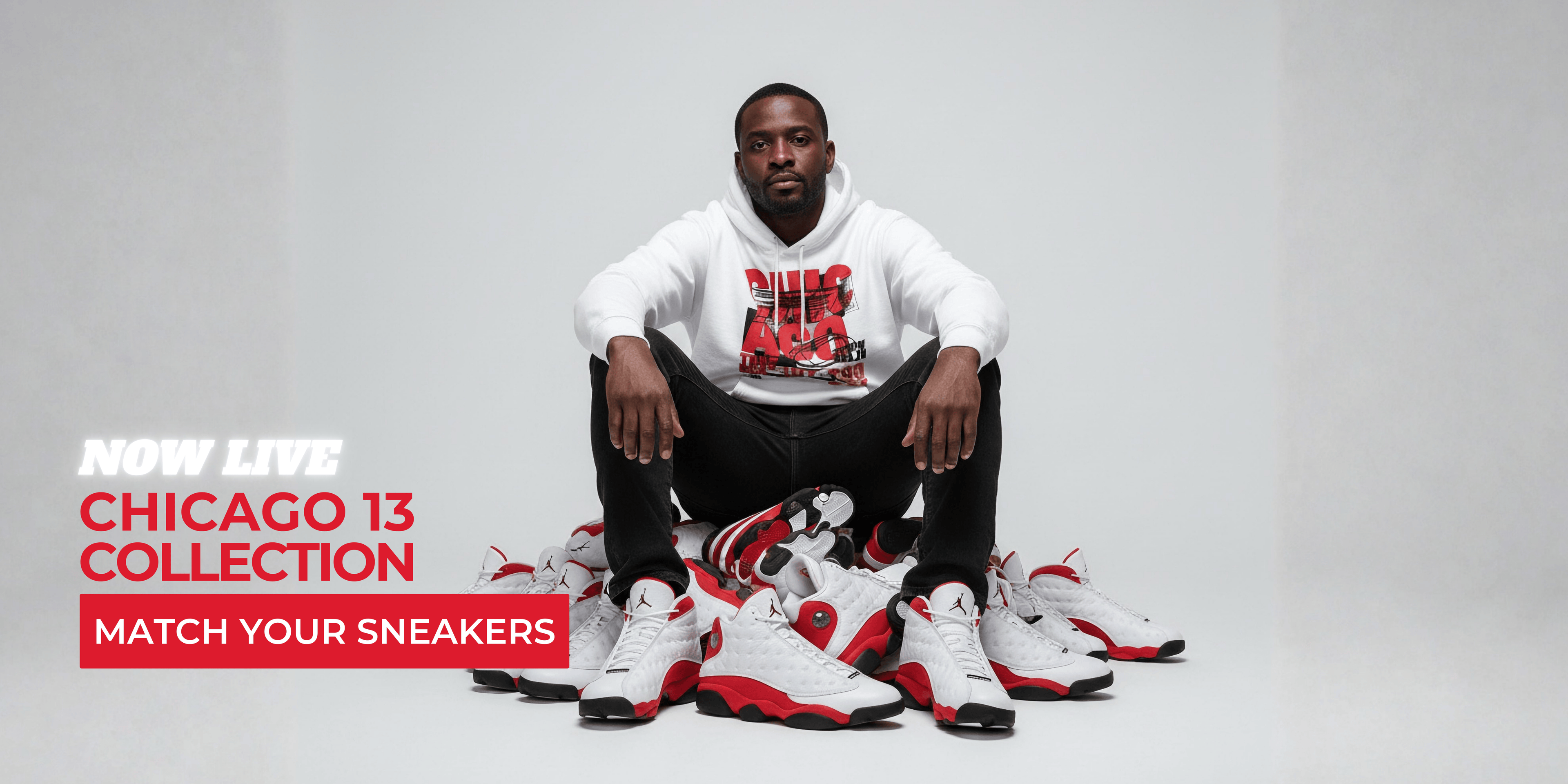 Man sitting on a stack of Jordan 13 sneakers with promotional text for the 'Chicago 13 Collection' on a gray background.