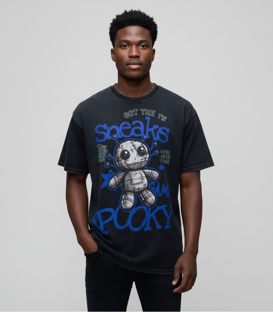 Man wearing a black t-shirt with a graphic design and text on a gray background