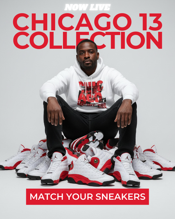 Man wearing a white hoodie with red text, sitting among white and Air Jordan 13 Chicago sneakers on a gray background.