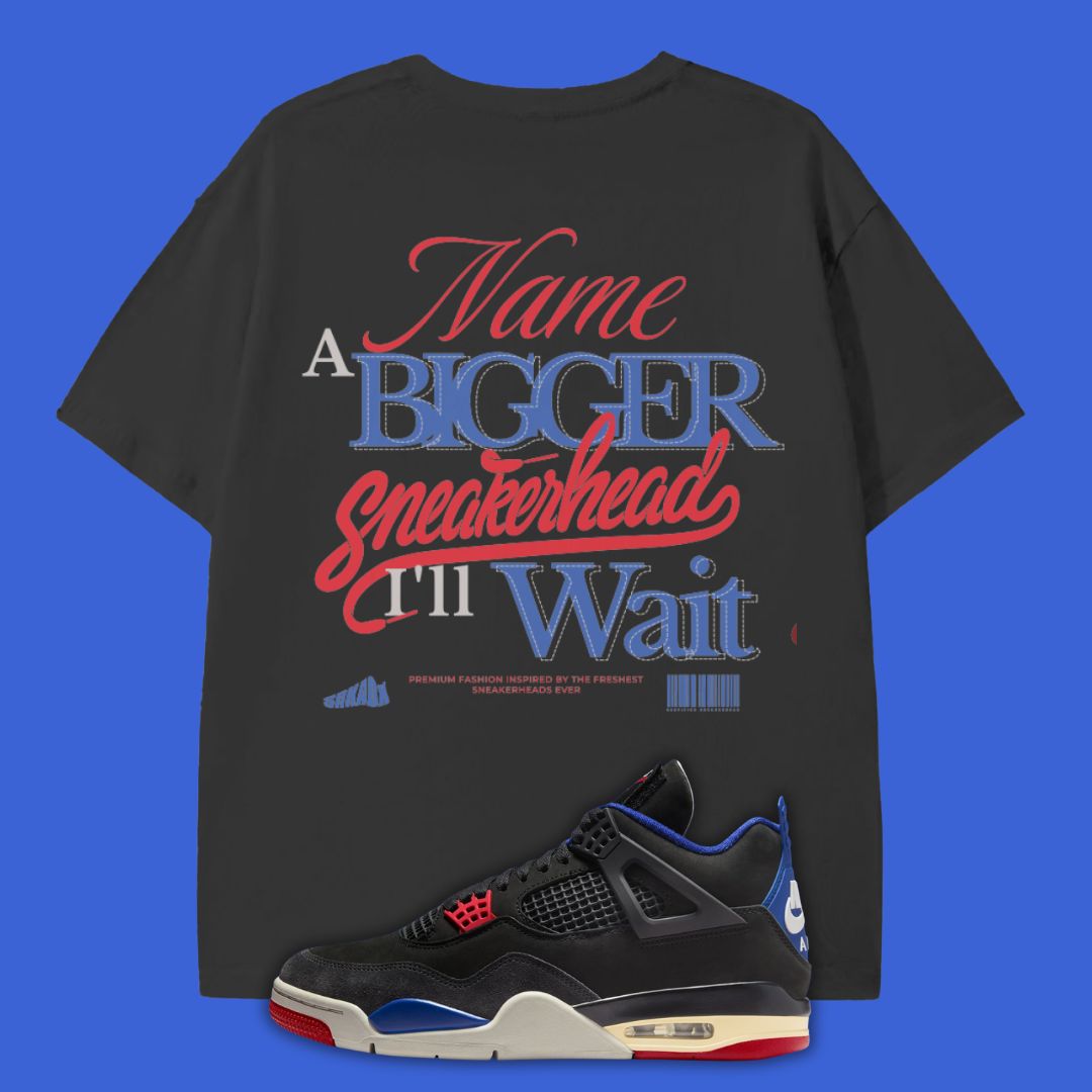 Black t-shirt with colorful text and a black sneaker with red and blue accents on a blue background