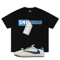 Black t-shirt with 'SNKHEAD' graphic and a white fragment x Travis Scott x Air Jordan 1 Low White/Blue sneaker with blue accents on a white background