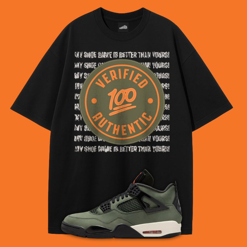 Black t-shirt with 'Verified 100 Authentic' design and Air Jordan 4 Undefeated sneaker on an orange background