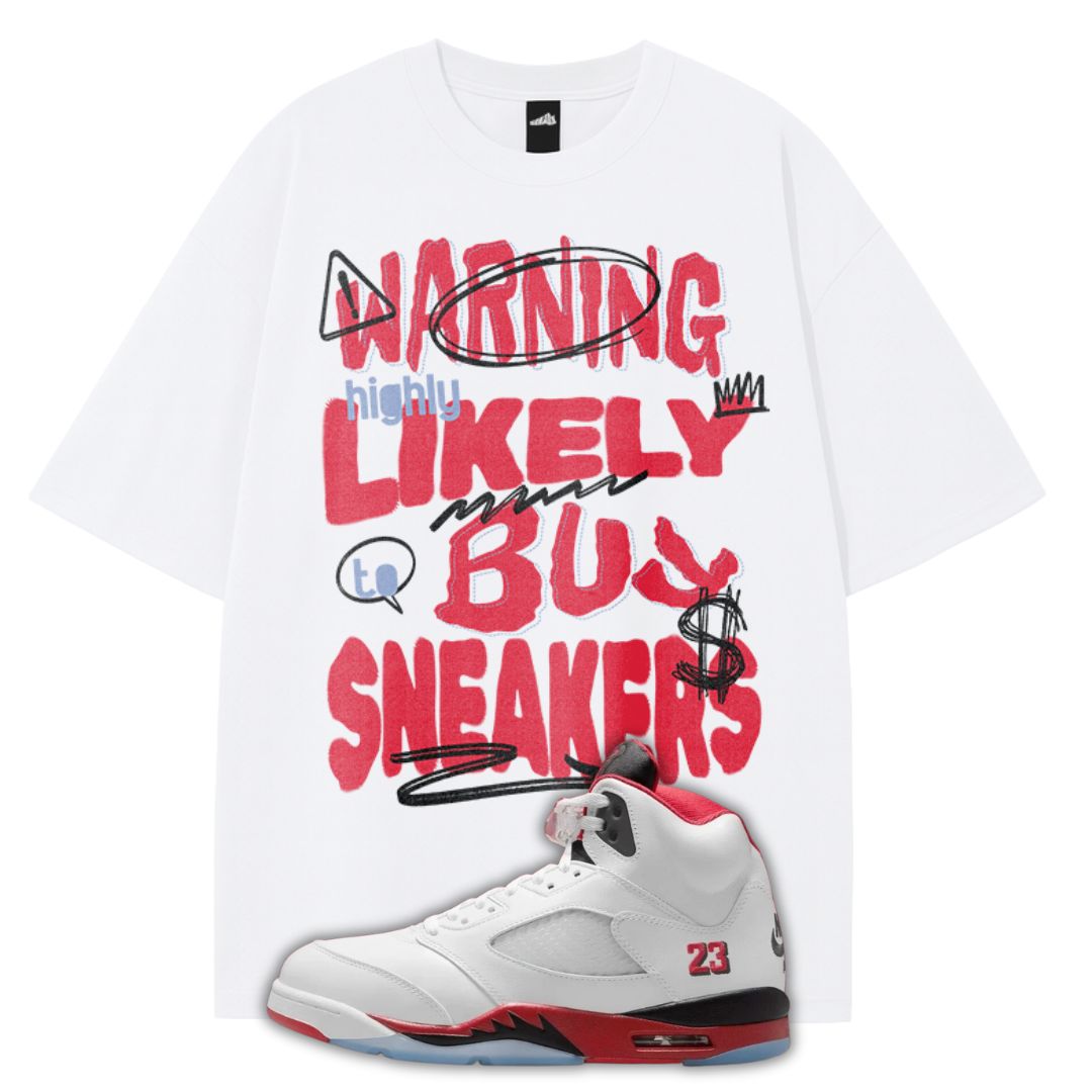 White t-shirt with red and black text and a white sneaker with red and black accents on a white background