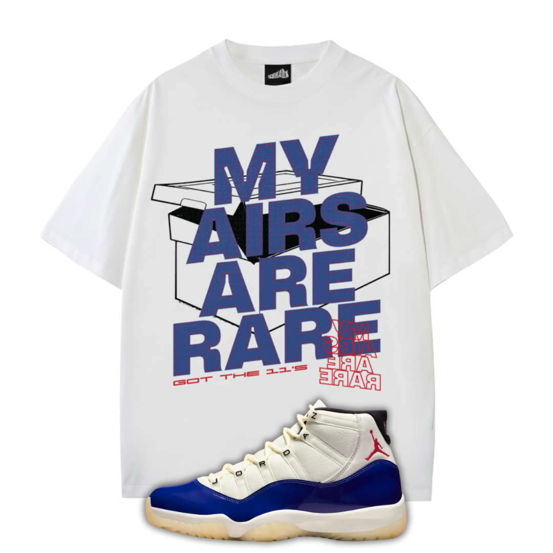 White t-shirt with 'My Airs Are Rare' text and a Air Jordan 11 Rare Air sneaker on a white background