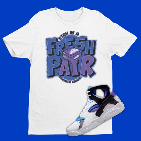 Nike Air Flight Huarache Varsity Purple and Royal Blue matching shirt with shoe box on the front