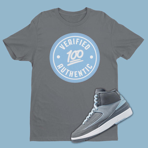Grey t-shirt featuring a graphic of Authentication Tag with 100 emoji, designed to complement the sleek and stylish Air Jordan 2 Cool Grey sneakers