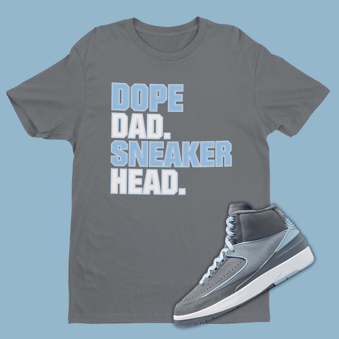 Grey t-shirt featuring a graphic of Michael Jordan dunking, designed to complement the sleek and stylish Air Jordan 2 Cool Grey sneakers